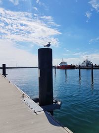 Pier on sea against sky