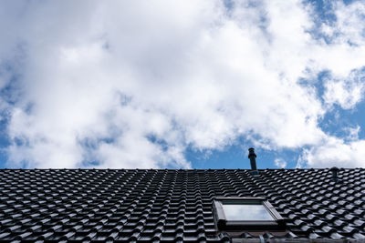 Low angle view of roof of building against sky