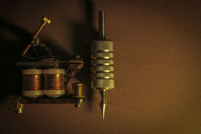 Close-up of coffee beans on table against wall