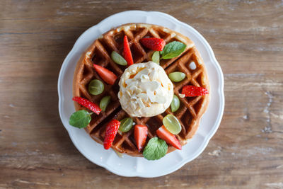 Close-up of waffle in plate on table