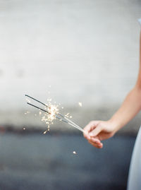 Close-up of hand with sparklers 