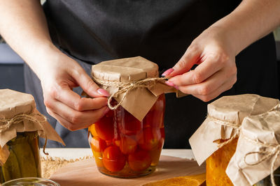 Midsection of man preparing food