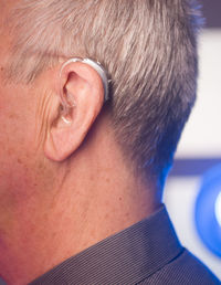 Close-up of man wearing hearing aid