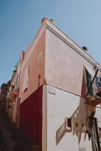 Low angle view of residential building against clear sky