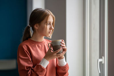 Young woman using mobile phone