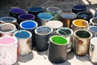 Paint cans arranged