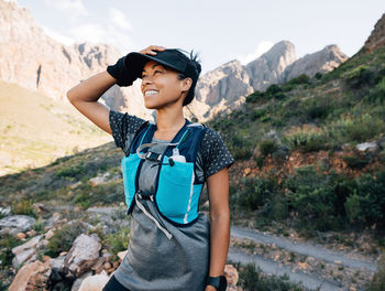 Young woman standing on mountain