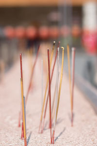 Burning incenses on sand