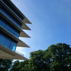 Low angle view of building against blue sky