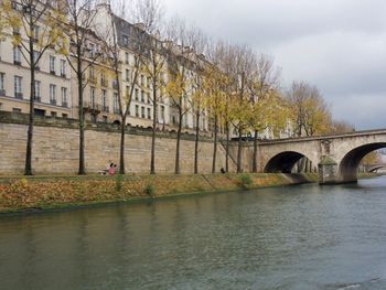 Bridge over river against sky