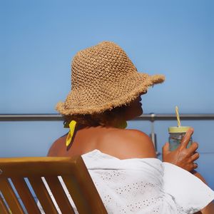 Rear view of woman looking away