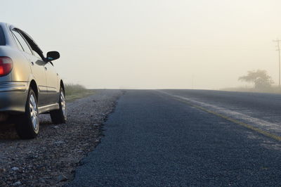 Road against clear sky