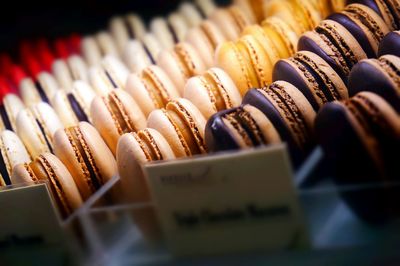 Close-up of colorful macaroons in store