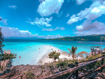 Scenic view of sea against blue sky