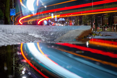 Light trails on illuminated city at night