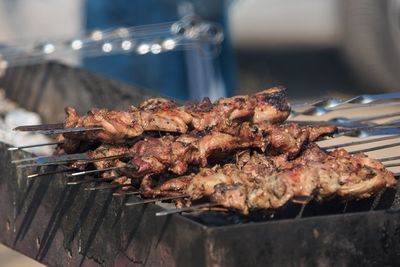 Close-up of meat on barbecue grill