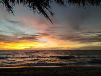 Scenic view of sea against sky at sunset