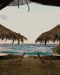 Scenic view of beach against clear sky