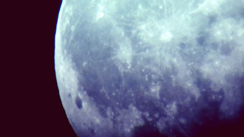 Low angle view of moon in sky