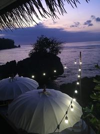 Scenic view of sea against sky at sunset