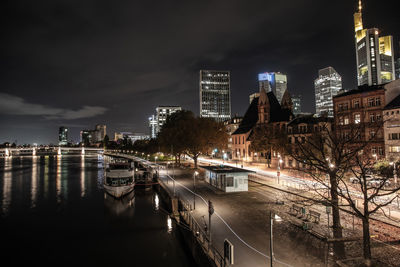 Illuminated buildings in city at night