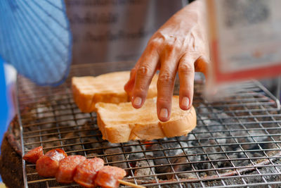 Close-up of meat on barbecue grill