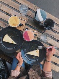 High angle view of woman preparing food on table