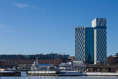Modern buildings against blue sky