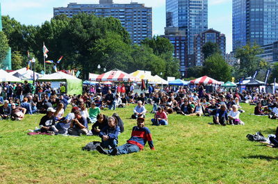 People relaxing in park