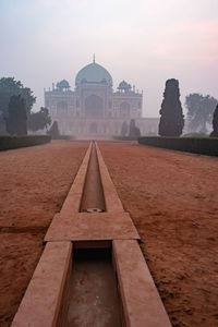 Humayun tomb at misty morning from unique perspective