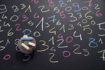 High angle view of number on blackboard