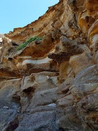 Low angle view of rock formation