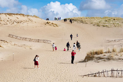 People enjoying in desert