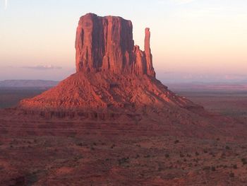 Scenic view of landscape against sky during sunset