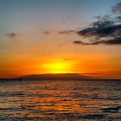 Dramatic sky over sea during sunset