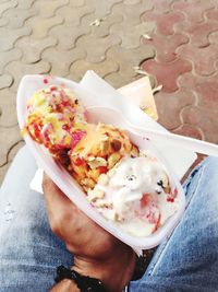 Close-up of woman holding ice cream