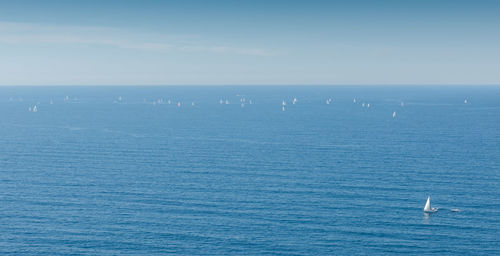 Scenic view of blue sea against sky