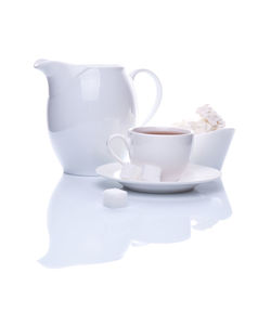 Close-up of coffee cup against white background