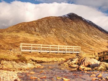 Popular bridge over the river coupall under a82 highway, the glen coe valley in scottish highlands