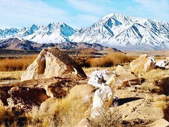 Scenic view of snowcapped mountains against sky
