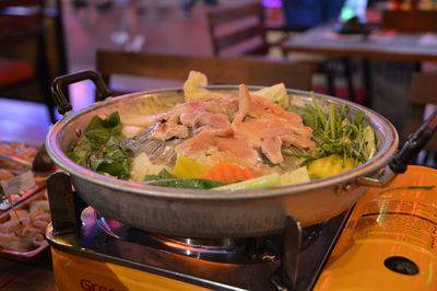 Unlimited grill and hotpot with 5 types of meat, serve on gas stove on pub street, siem reap