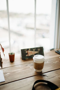 Close-up of coffee cup on table