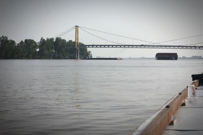 View of suspension bridge over river