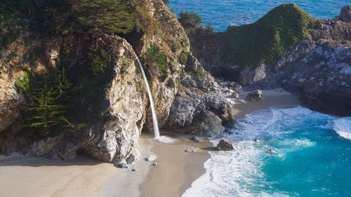 Scenic view of rock formation in sea