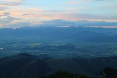 Scenic view of mountains against sky during sunset