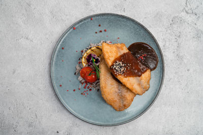 Directly above shot of food in plate on table