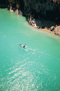 High angle view of people on sea