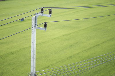 High angle view of wind turbines on field