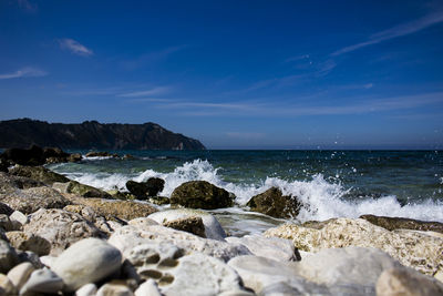 View of waves breaking on shore