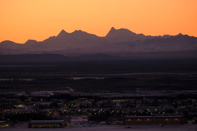 High angle view of cityscape against sky during sunset